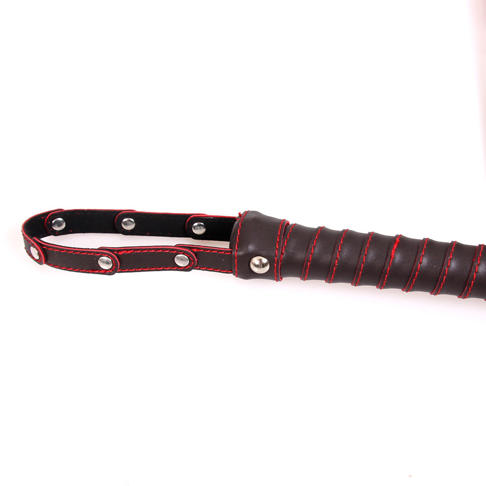 Red and Black Leatherette Flogger with Rivet Detail on the Hand Loop