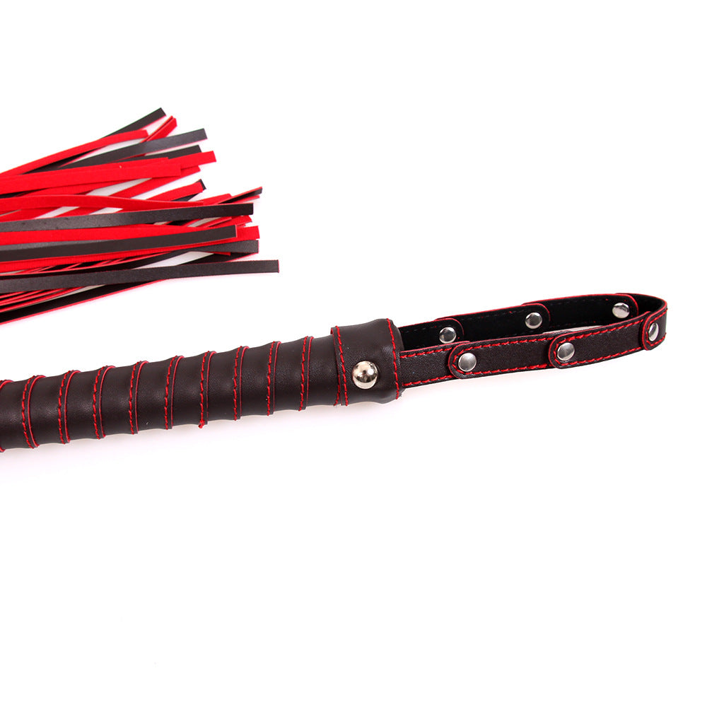 Red and Black Leatherette Flogger with Rivet Detail on the Hand Loop